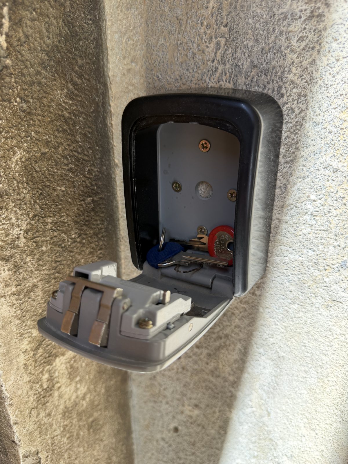 Open keybox with red and blue keys inside